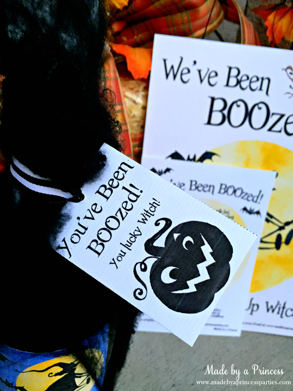 Close up of You've Been BOOzed wine bottle gift tag that reads, "You've Been BOOzed! You lucky witch!"