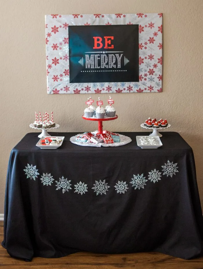 candy cane lane christmas party dessert table with sign
