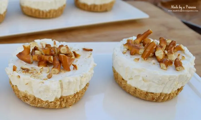 easy creamy pretzel crust no bake cheesecake crushed pretzels on top