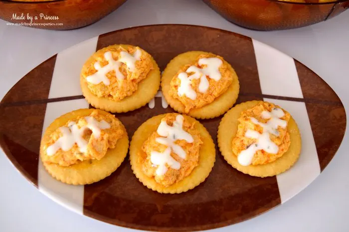 crock pot buffalo chicken dip on ritz crackers footballs 2