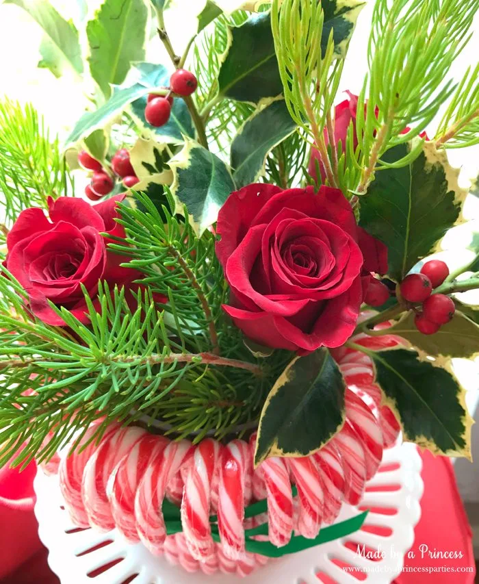 budget-friendly-holiday-mimosa-bar-party-red-roses-in-christmas-arrangement-in-candy-cane-vase