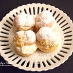 easy-champagne-cream-puffs-recipe-with-powdered-sugar