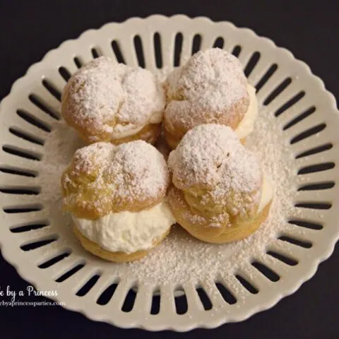 easy-champagne-cream-puffs-recipe-with-powdered-sugar