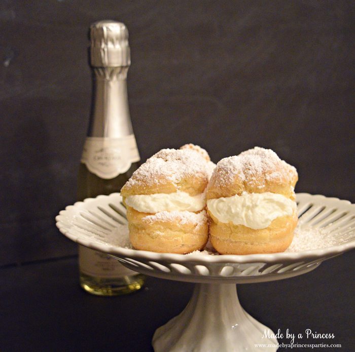 easy-champagne-cream-puffs-recipe-with-powdered-sugar-light-and-airy-puffs-with-champs-on-the-side