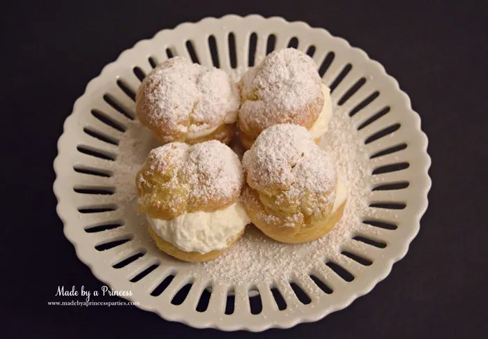 easy-champagne-cream-puffs-recipe-with-powdered-sugar