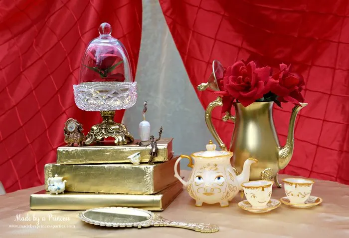 Host a quaint BEAUTY AND THE BEAST Themed Tea Party for Two. Paint a stack of books and thrift store find teapot gold to create a beautiful centerpiece. 