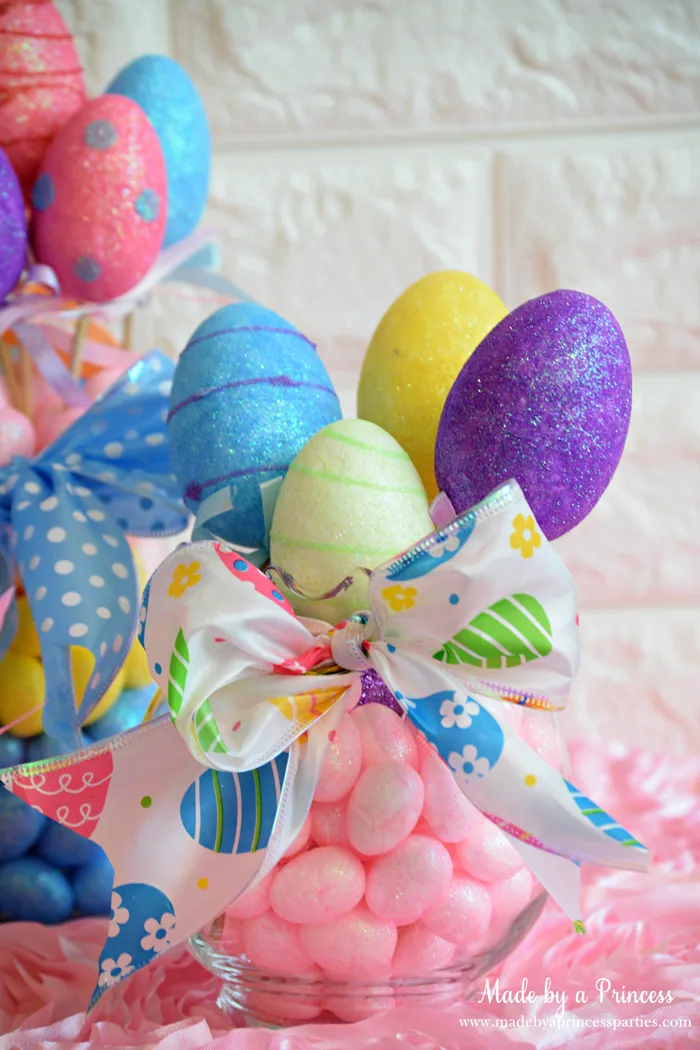 Creative Dollar Store Easter Centerpiece Tutorial pink mini eggs and eggs on sticks