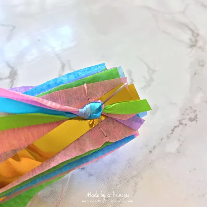 unicorn princess party hat idea tutorial push needle through layers including curling ribbon