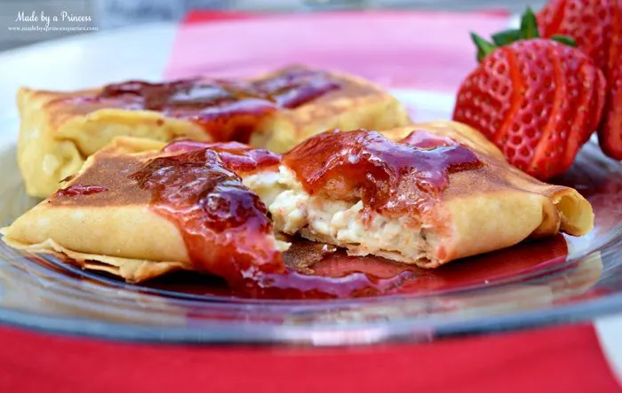 Savory Strawberry Preserves Toasted Coconut Almond Chicken Blintz Recipe filled with ricotta cream cheese and lemon zest