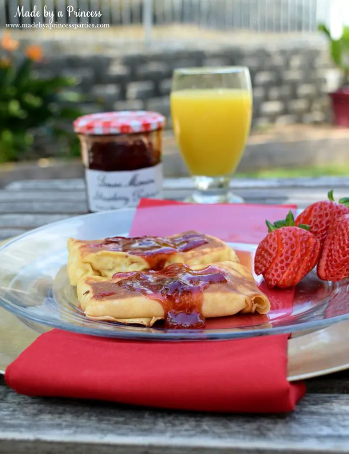 Savory Strawberry Preserves Toasted Coconut Almond Chicken Blintz Recipe served with fresh strawberries