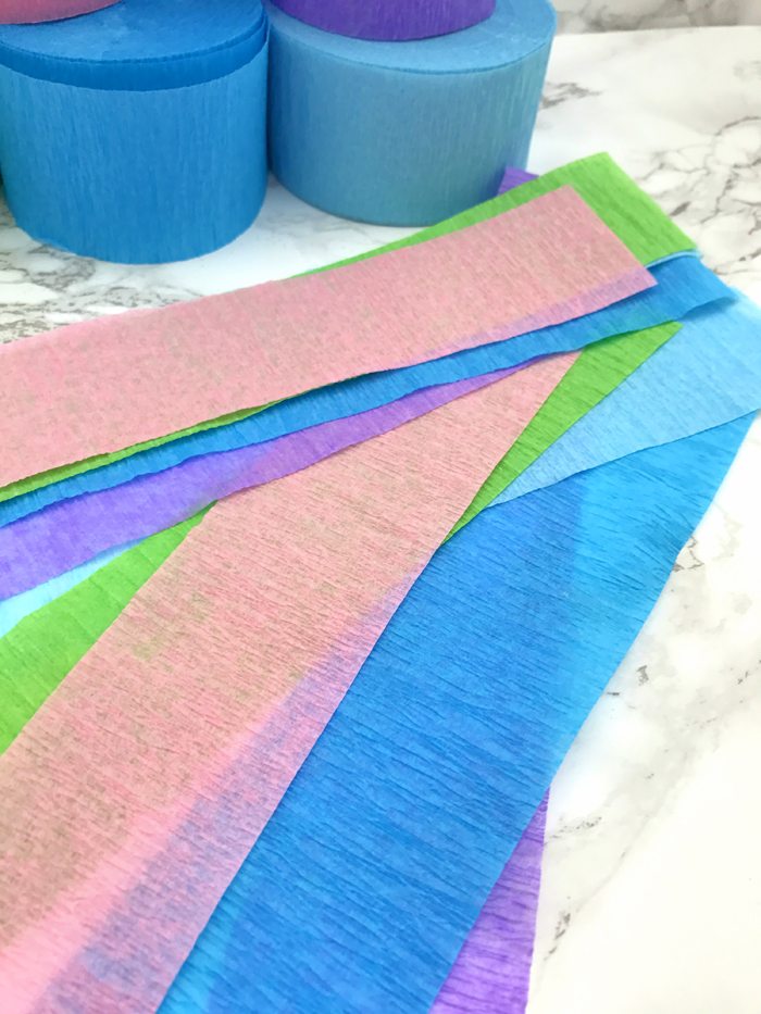 unicorn tail party idea tutorial cut strips of crepe paper
