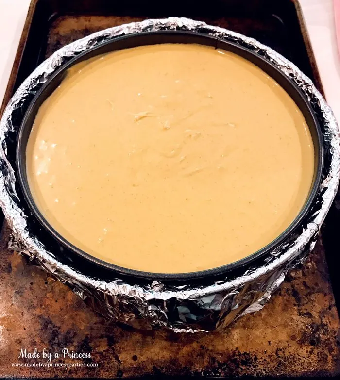 Gingerbread Cheesecake Dessert Recipe place springform in larger pan in water bath Made by a Princess #gingerbreadcheesecake