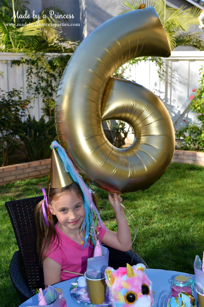 Unicorn Party Ideas Spray Paint Number Balloon Gold - Made by a Princess #unicorn #unicornparty