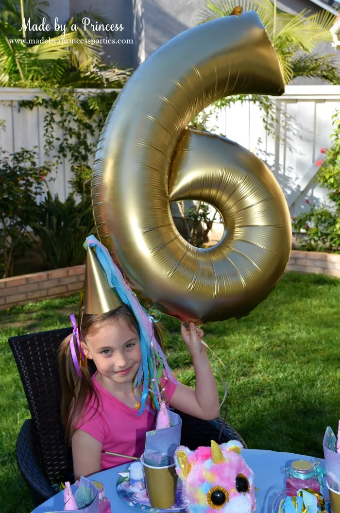 Unicorn Party Ideas Spray Paint Number Balloon Gold - Made by a Princess #unicorn #unicornparty