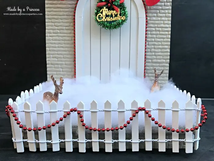 How to Create Your Own Tiny Elf Door Tutorial add fence and snow to MadebyaPrincess #elfdoor #fairydoor #elfdoorkit