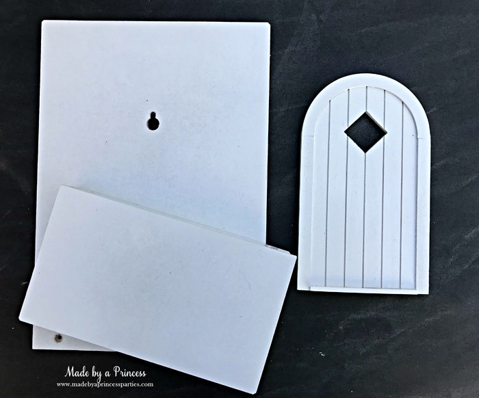 How to Create Your Own Tiny Elf Door Tutorial spray painted door MadebyaPrincess #elfdoor #fairydoor #elfdoorkit