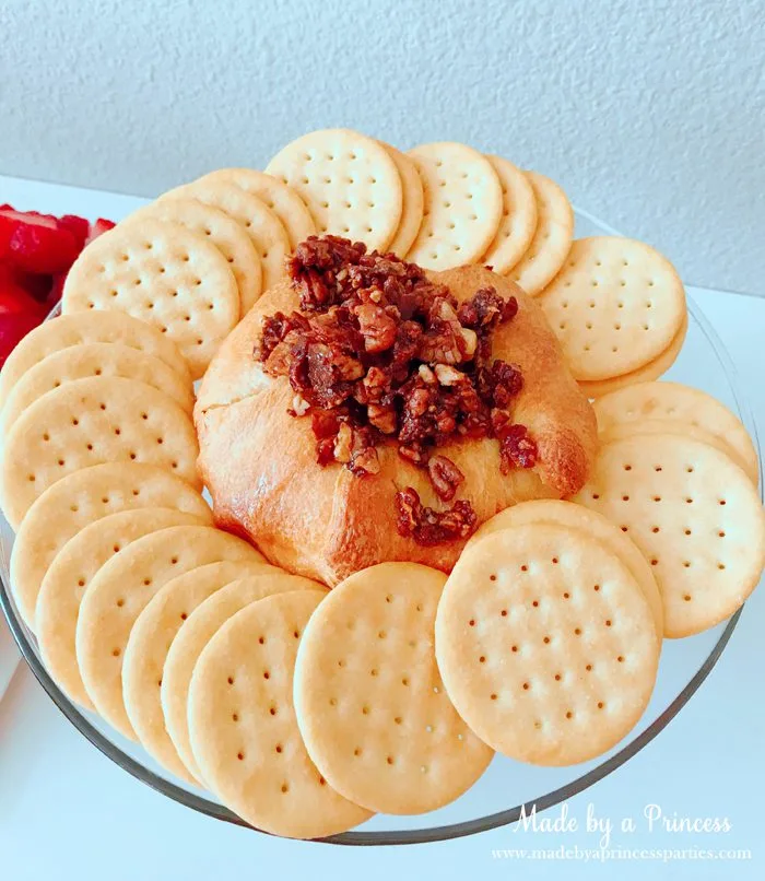 Pink Pumpkin Halloween Party Ideas candied pecan brie wheel Made by a Princess #pinkparty #pinkoween #pinkpumpkinparty