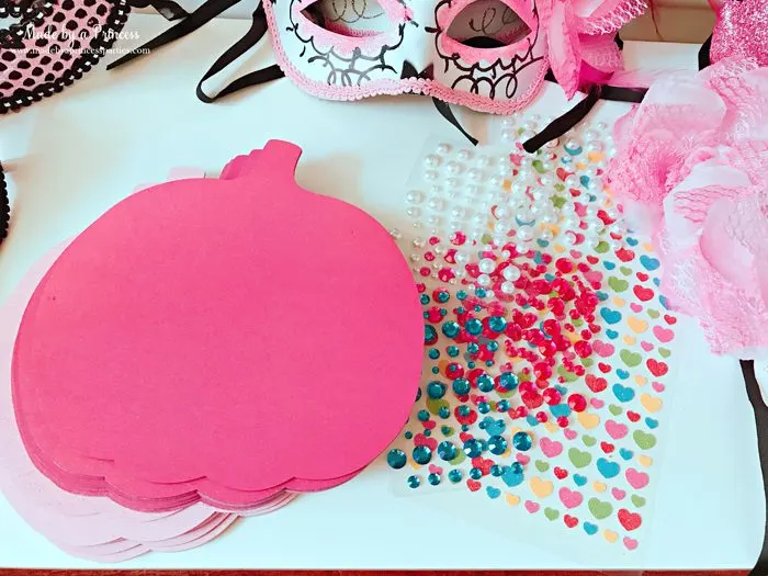 Pink Pumpkin Halloween Party Ideas pink painted wooden pumpkins with jewels Made by a Princess #pinkparty #pinkoween #pinkpumpkinparty