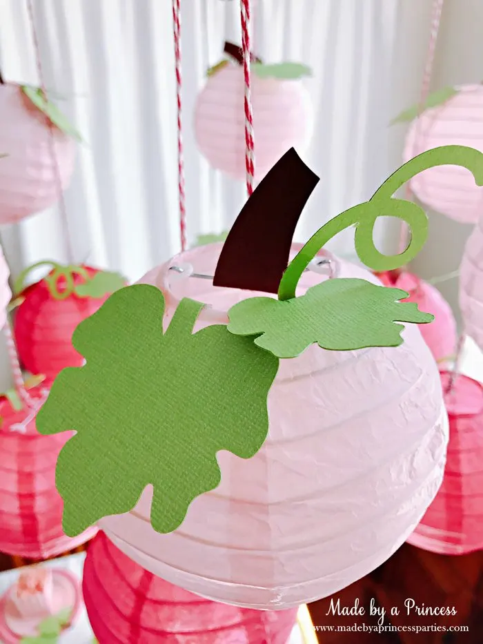 Pink Pumpkin Halloween Party Ideas pink paper lanterns turned to pumpkins Made by a Princess #pinkparty #pinkoween #pinkpumpkinparty
