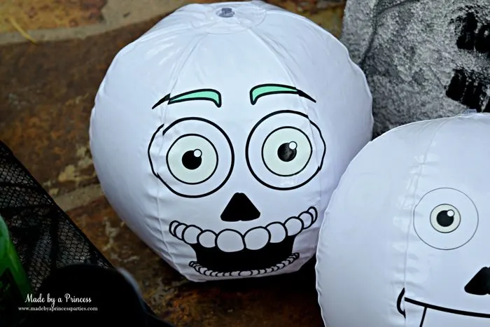 Teen Halloween Party Ideas glow in the dark beach balls Made by a Princess #halloweenparty #teenhalloween