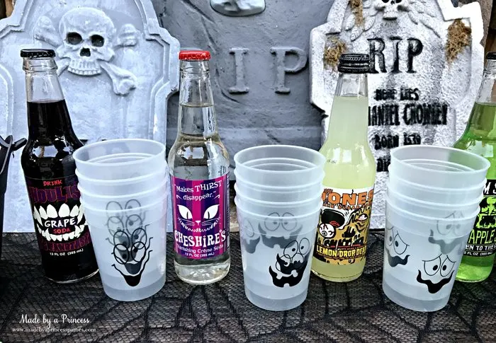 Teen Halloween Party Ideas glow in the dark cups halloween themed drinks Made by a Princess #halloweenparty #teenhalloween