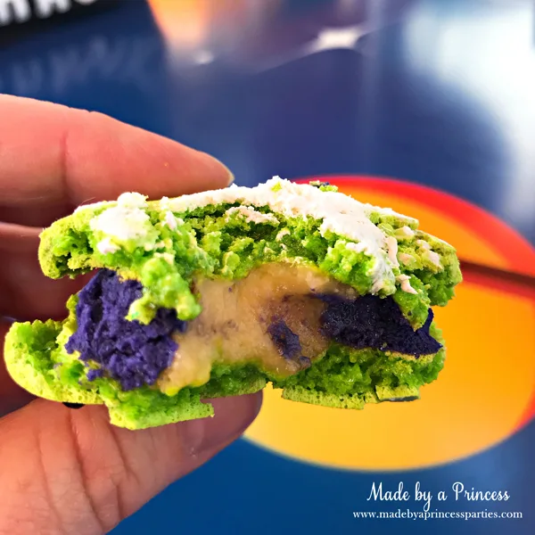 Disneylands Best Pixar Fest Food Checklist Toy Story Alien Macaron inside filled with lemon blackberry #disneylandfood #disneyfood #toystory #pixarfest #madebyaprincess