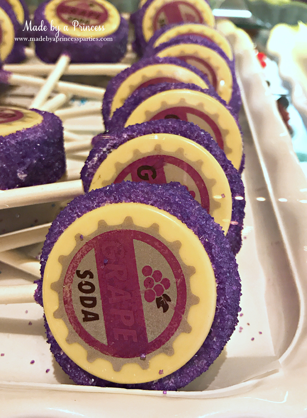 Disneylands Best Pixar Fest Food Checklist UP Ellie Grape Soda Cake Pops #disneylandfood #disneyfood #up #pixarfest #madebyaprincess