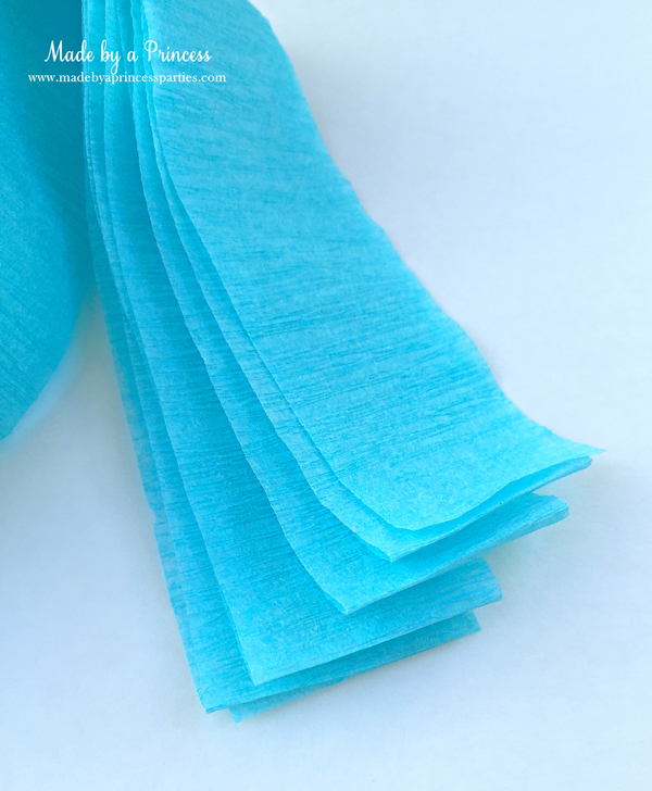 How to Make Tassel Garland with Crepe Paper fold strips in half