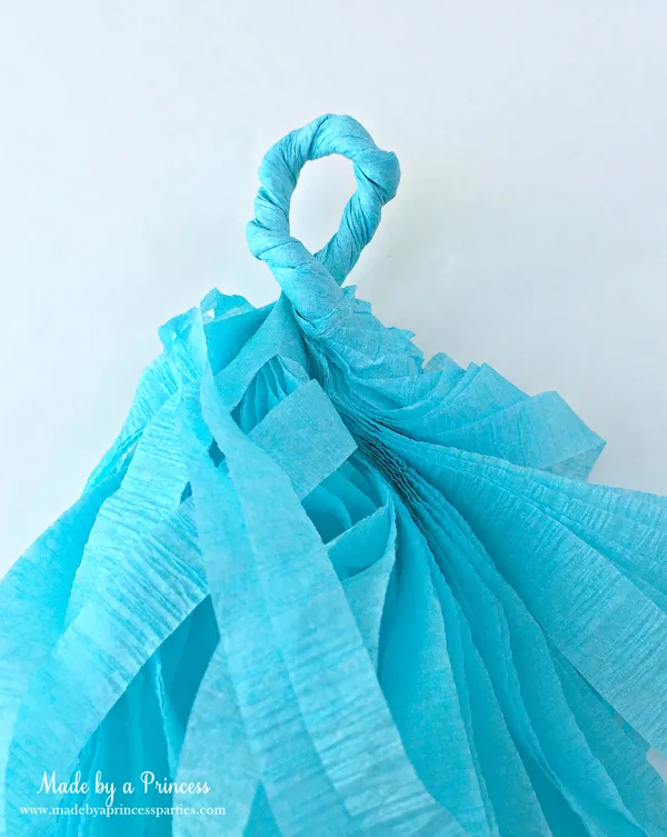 How to Make Tassel Garland with Crepe Paper twist at the top and run twine through loop to hang