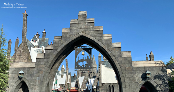 Gates of Hogsmeade says Please Respect the Smell Limits