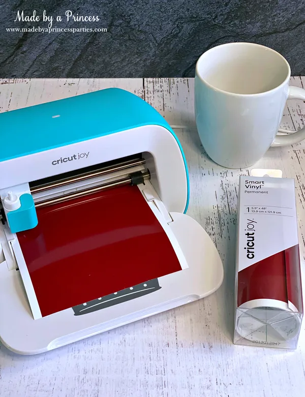 Cut off a piece of Cricut Joy Smart Vinyl and load it into the machine with no mat
