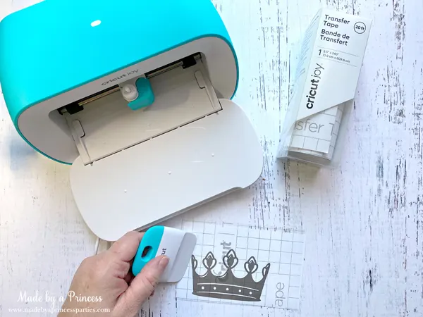 use the Cricut Joy scraper to smooth out small decals